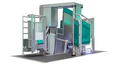 یک نمونه از ربات شیردوش مدرن در حال کار در ایستگاه شیردوشی خودکار