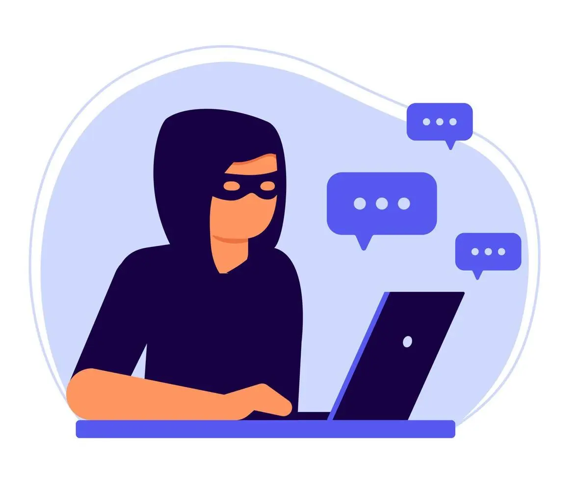یک هکر در حال کار بر روی کامپیوتر برای انجام کلاهبرداری‌های آنلاین