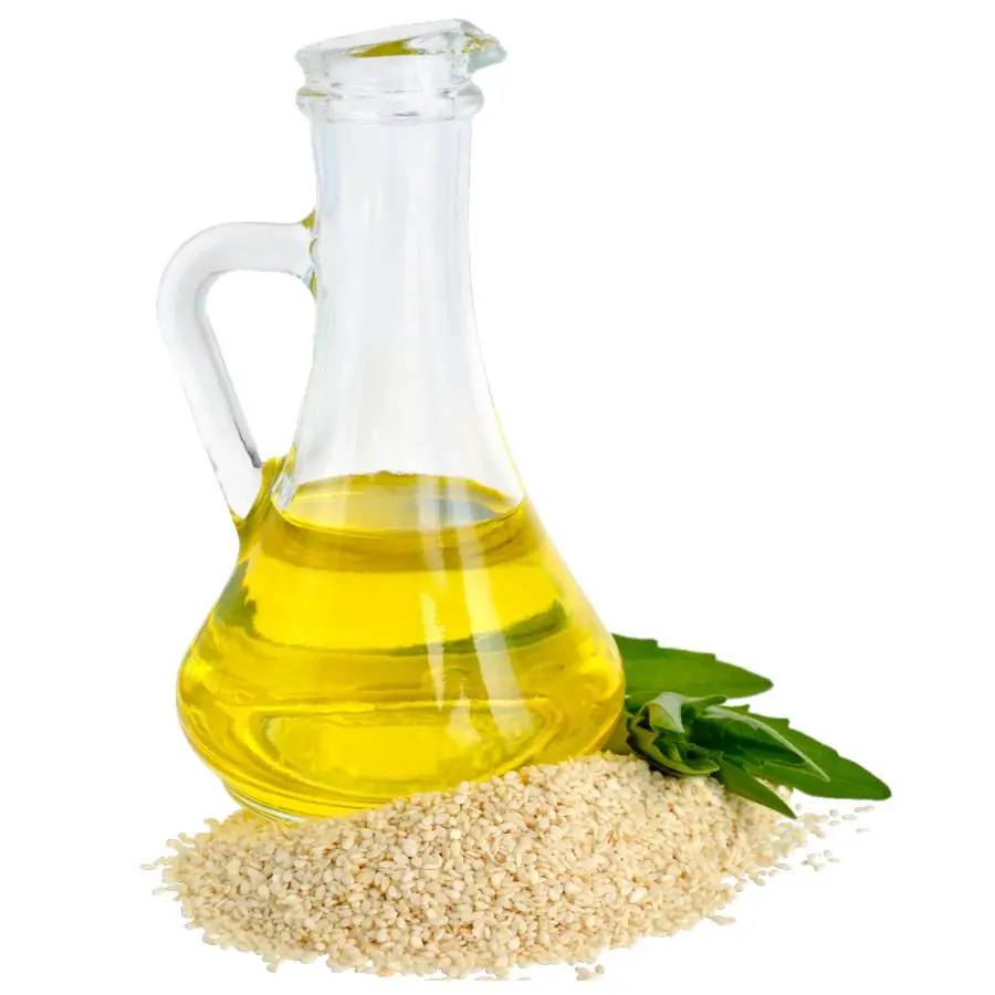 روغن کنجد در ظرف شیشه‌ای با دانه‌های کنجد اطراف آن